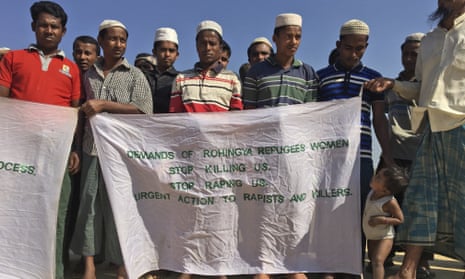 Rohingya refugees in Bangladesh hold banners expressing their fears over being sent back to Myanmar.