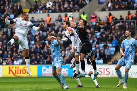 Parallel lives: Coventry and Luton’s long roads collide in playoff final | Championship 5 Coventry’s Ben Wilson clears an attack in a Championship match against Luton in February