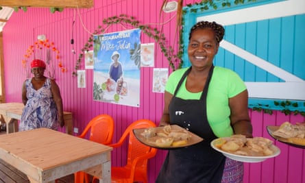 Ferma Livingston serves tourists at her restaurant in Manzanillo Bay. ‘What we do have is peace and tranquillity.’