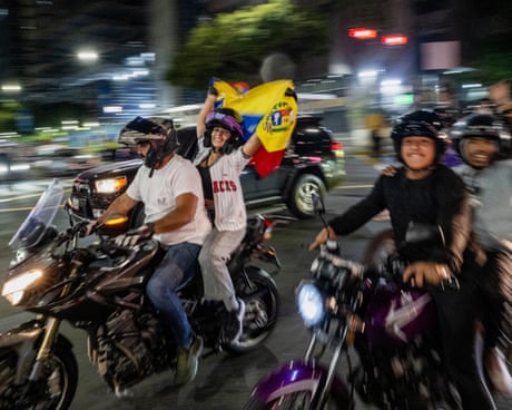 Venezuela fans celebrate their team's win over the US in the World Baseball Classic on Tuesday night in Caracas.
