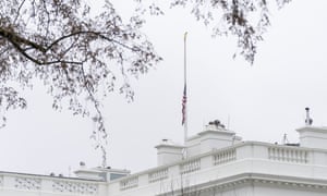 The American flag files at half-staff at the White House Thursday.
