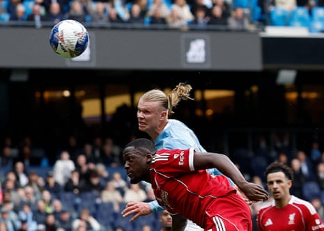 Erling Haaland scores a header