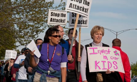 Union members picket a Republican fundraiser featuring then-Wisconsin Governor Scott Walker.