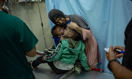 Palestinians wounded in an Israeli bombardment at a hospital in Khan Younis.