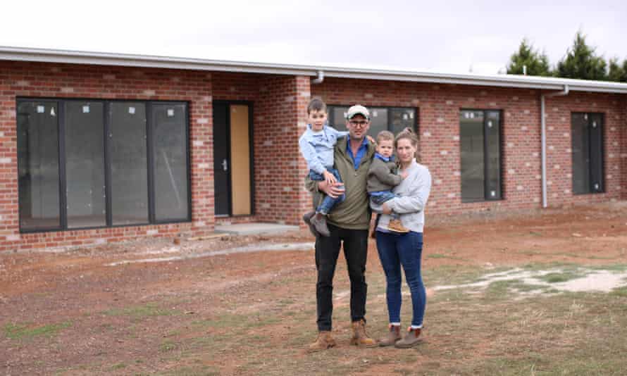 Hugo, Shaun, Freddie and Danika Cleary in front of their newly built property in Smeaton, Victoria