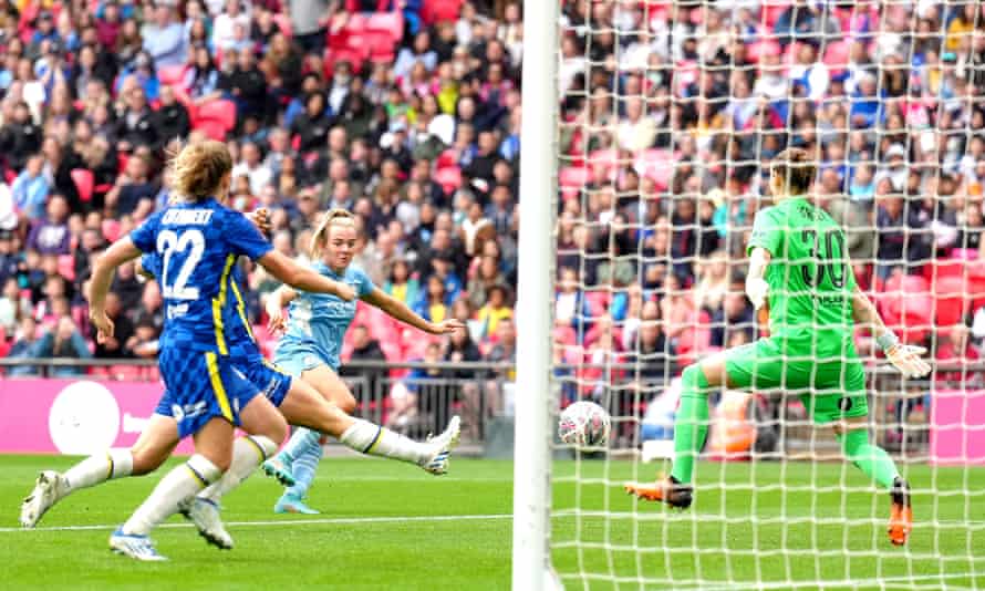 Manchester City’s Lauren Hemp (centre) shoots but is denied by Chelsea’s keeper Ann-Katrin Berger.