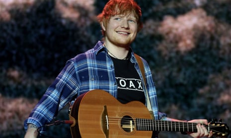 Ed Sheeran performing on stage