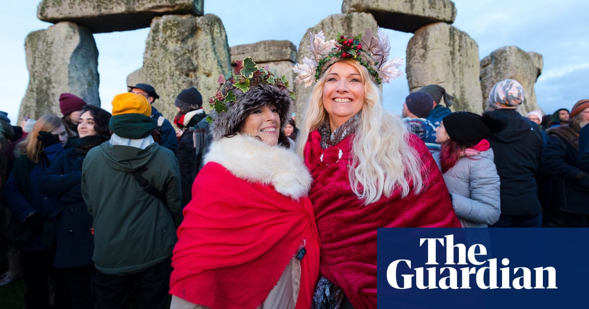 Druids And Dancers Gather At Stonehenge To Mark Winter Solstice Stonehenge The Guardian