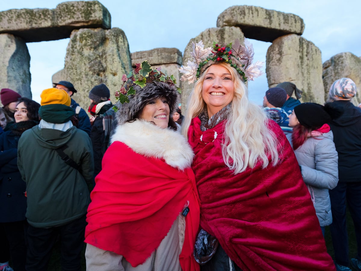 Druids And Dancers Gather At Stonehenge To Mark Winter Solstice Stonehenge The Guardian