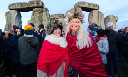 Druids And Dancers Gather At Stonehenge To Mark Winter Solstice Stonehenge The Guardian