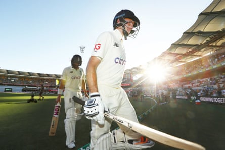 England’s Joe Root and Dawid Malan leave the Gabba after their unbe159-run stand
