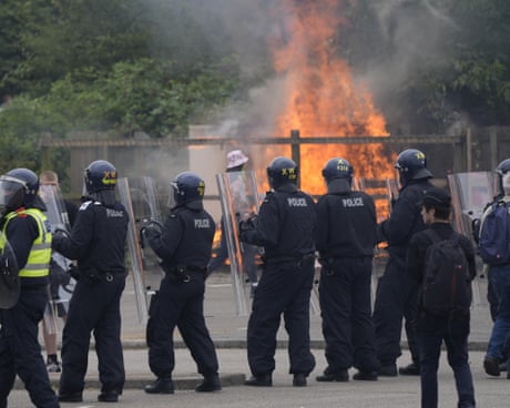 Police respond at an anti-immigration demonstration.