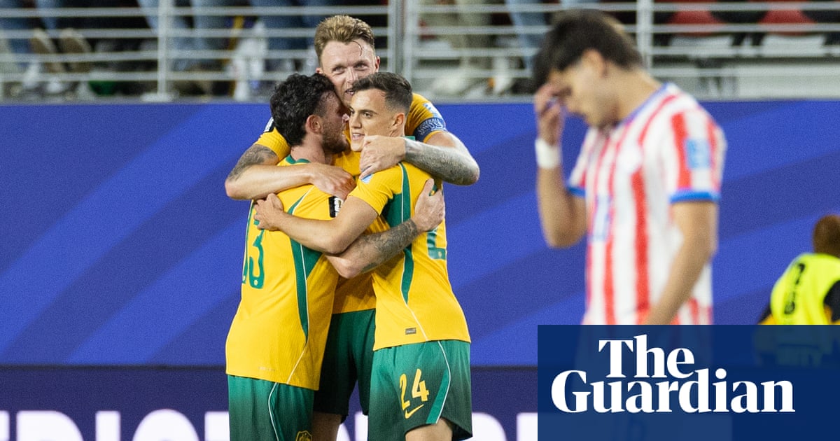 Socceroos secure place in World Cup last 32 after nerve-shredding draw with Paraguay
