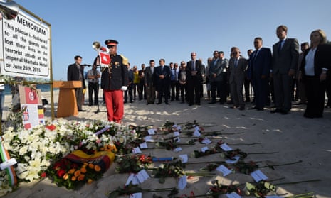 British and Tunisian officials attend a ceremony last June in memory of those killed in the Sousse attack