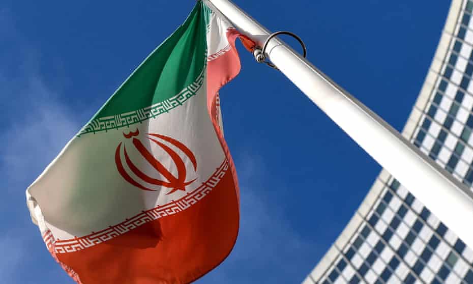 The Iranian flag is seen outside the International Atomic Energy Agency headquarters in Vienna
