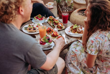 People eating a meal on holiday