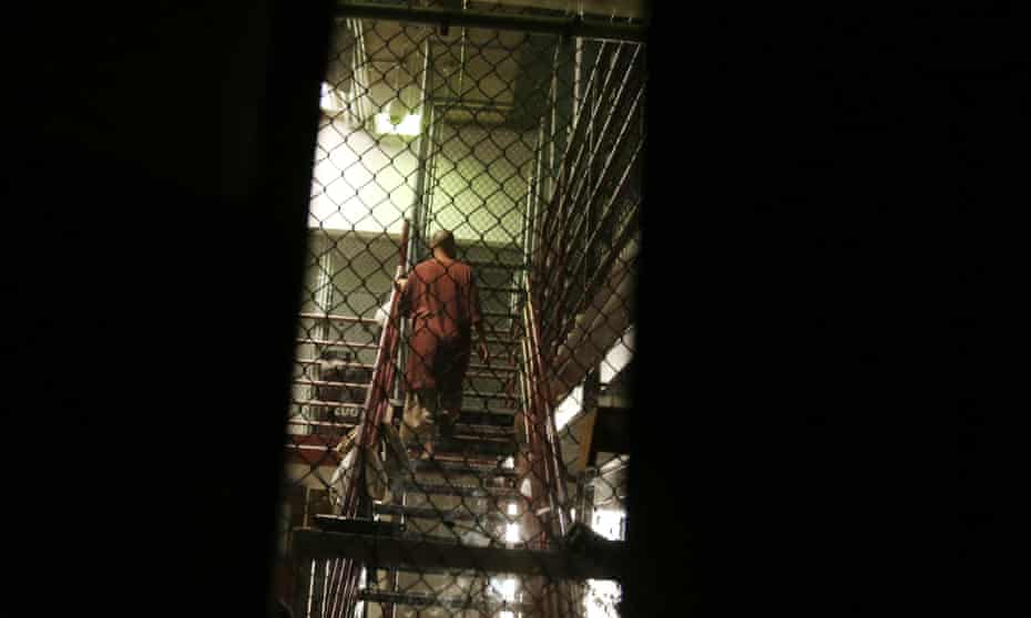 A detainee is seen going up the stairs at the US detention center at Guantánamo Bay, Cuba. 