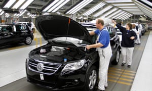 Workers in a production line in the Volkswagen plant in Wolfsburg, Germany in 2011. VW has been handed a $125m fine for deceiving customers over emissions from diesel vehicles.