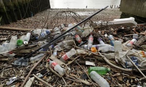 Plastic rubbish washed up on the north bank of the River Thames in London.