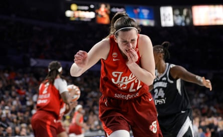 Caitlin Clark reacts after being hurt during the second half of the Indiana Fever’s Game 3 playoff loss to the Las Vegas Aces on Thursday in Las Vegas.