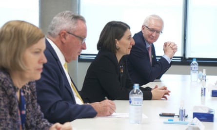 Kerry Chant, Brad Hazzard, Gladys Berejiklian and Tim Reardon, greeting Victorian contact tracers.
