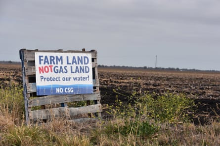 A sign in a field says âÂÂFarmland not gas landâÂÂ