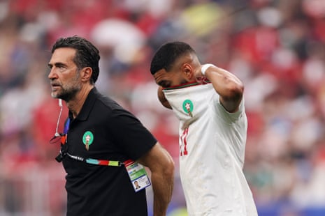 A dejected Ismael Saibari walks after sustaining an injury