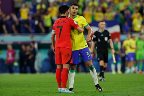 South Korea's Son Heung Min and Brazil's Casemiro at the final whistle.