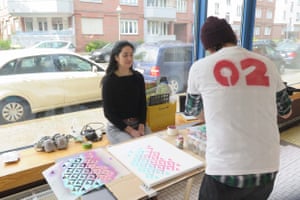 Street artist Emess at Schau Fenster, with co-organiser Samsarah Lilja