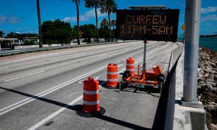 A curfew sign in Miami, Florida, in March 2020.