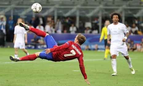 Antoine Griezmann attempts the spectacular but his shot goes well wide.