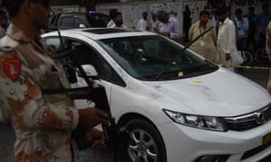 A bullet-riddled car in the Liaqatabad area of Karachi, after the gun attack on Amjad Sabri.