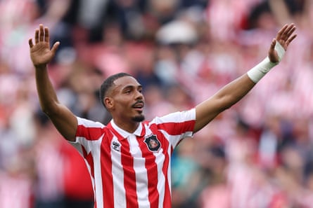 Wilson Isidor salutes the fans after scoring.