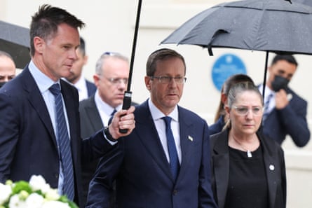 The NSW premier, Chris Minns, left, with the Israeli president, Isaac Herzog, during a ceremony to honour the victims of the Bondi beach terror attack
