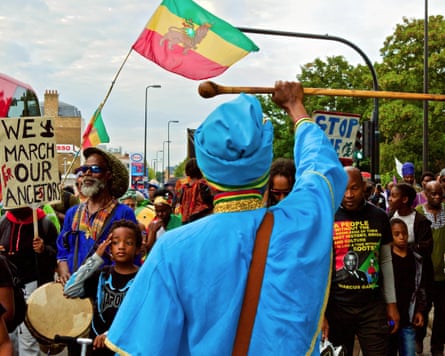 An image of protesters marching from Brixton to Westminster during the Afrikan Emancipation Day Reparations March in 2019
