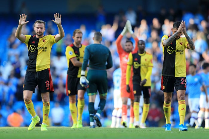 Tom Cleverley apologises after the match.