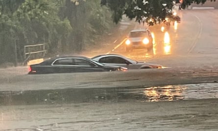 Vehicles submerged by flood waters seen in images by the Dallas police department.