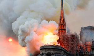 Smoke and flames rise during the fire at Notre-Dame Cathedral in Paris