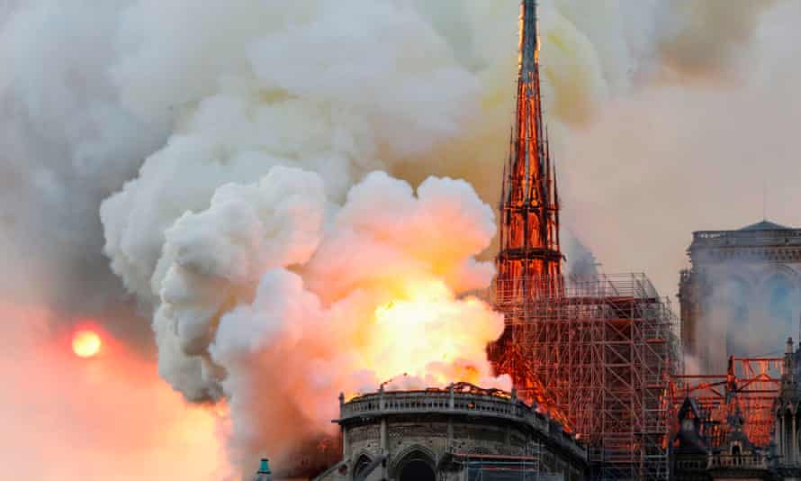 Smoke and flames rise during the fire at Notre-Dame Cathedral in Paris