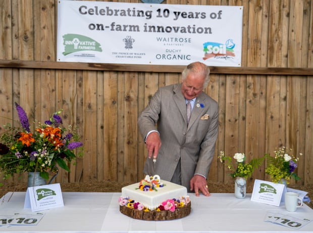 In July, then-Prince Charles cut a celebratory cake with members of the Innovative Farmers Network at the Duchy Organic pop-up cafe in Launceston.