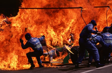 Benetton-Renault Team and mechanics in flames after a refuelling incident at the German Grand Prix, 1994