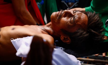 Man being nailed to cross