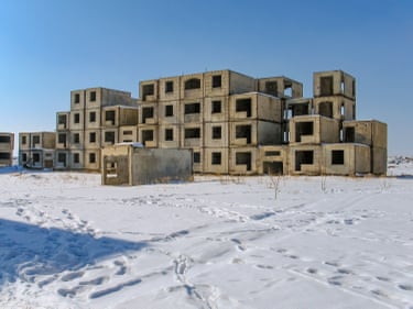 Vahram Aghasyan, ModalityModality presents Armenian artist Vahram Aghasyan’s images of unfinished Soviet residential buildings suspended within a snow-covered Armenian landscape. Construction began in 1988 as part of a planned urban development intended to house people displaced by a major earthquake, but the project was never completed. Photographed in 2008, and still unchanged decades later, these structures remain suspended between intention and realisation. The work therefore reflects on interruption, failed futures and the lingering presence of unrealised social ambition