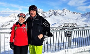 Sieglinde Schopf and her husband Hannes Schopf, a retired journalist, posing near the Albonabahn cable car during their ski holidays in the Austrian Alps in Stuben, Vorarlberg.
