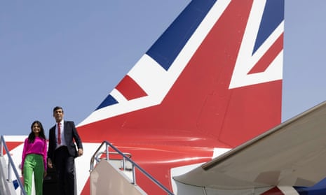 Rishi Sunak and his wife, Akshata Murty, arriving in Japan yesterday.