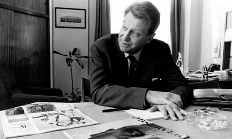 David Astor in his office with the first Observer Magazine in 1964.