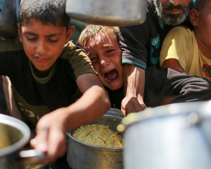 Donald Trump could stop Gaza’s famine. Instead he’s following Biden’s lead | Mohamad Bazzi