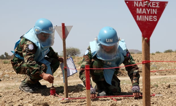 Experts demonstrating landmine clearance