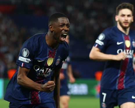 Paris St Germain’s Ousmane Dembele celebrates scoring their third goal.