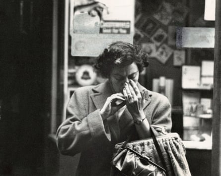 Woman lighting a match